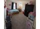 Bedroom with carpet, closet, one bed, a playhouse and other toys at 6812 Cadwell Cir, Indianapolis, IN 46237