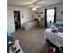 Bedroom with carpet, closet, two twin beds, and a ceiling fan at 6812 Cadwell Cir, Indianapolis, IN 46237
