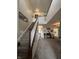 A grand two-story foyer with hardwood floors and a staircase with wooden railings at 6812 Cadwell Cir, Indianapolis, IN 46237