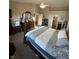 Spacious main bedroom features an ensuite bath and neutral colors at 6812 Cadwell Cir, Indianapolis, IN 46237