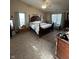 Large bedroom with vaulted ceilings, a ceiling fan and lots of natural light at 6812 Cadwell Cir, Indianapolis, IN 46237