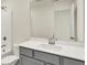 Bathroom featuring a sink and a shower/tub combination at 7152 Jackson Dr, Cumberland, IN 46229