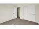 A cozy bedroom is ready for your personal touch with neutral walls and a closet at 7152 Jackson Dr, Cumberland, IN 46229