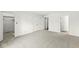 A carpeted bedroom offering versatile access to a closet and bathroom at 7434 King George Dr # A, Indianapolis, IN 46260