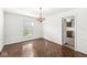 Formal dining room featuring elegant chandelier at 7434 King George Dr # A, Indianapolis, IN 46260