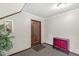 Inviting entrance area featuring decorative accents, neutral walls, and modern carpet, enhancing the arrival experience at 7434 King George Dr # A, Indianapolis, IN 46260