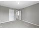 Neutral bedroom featuring carpet, a light grey paint color and multiple closets for storage space at 903 E 16Th St, Indianapolis, IN 46202