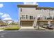 Charming townhouse features a two-car garage and balconies for outdoor enjoyment at 903 E 16Th St, Indianapolis, IN 46202