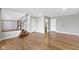 Spacious living room featuring hardwood floors, neutral paint and ample natural light at 903 E 16Th St, Indianapolis, IN 46202