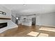 Open living space with fireplace and hardwood flooring at 903 E 16Th St, Indianapolis, IN 46202