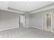 Large main bedroom with neutral tones and ensuite bathroom access at 903 E 16Th St, Indianapolis, IN 46202