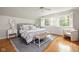 Bright bedroom with large windows and hardwood floors at 9080 Pickwick Dr, Indianapolis, IN 46260
