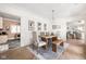 Bright dining room with hardwood floors and neutral decor at 9080 Pickwick Dr, Indianapolis, IN 46260