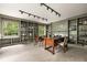 Spacious home office with built-in bookshelves and natural light at 9080 Pickwick Dr, Indianapolis, IN 46260