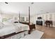 Beautiful main bedroom with a fireplace and sitting area at 9080 Pickwick Dr, Indianapolis, IN 46260