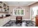 Traditional office with a window view and dark slate flooring at 9080 Pickwick Dr, Indianapolis, IN 46260
