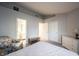 Spacious bedroom with vaulted ceilings, closet, and ensuite bathroom at 9303 Aintree Dr, Indianapolis, IN 46250