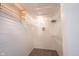 Organized walk-in closet with built-in shelving, offering ample storage space for clothes and accessories at 9303 Aintree Dr, Indianapolis, IN 46250
