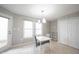 Bright eat-in kitchen featuring a dining area, updated fixtures and large pantry at 9303 Aintree Dr, Indianapolis, IN 46250