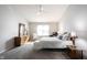 Bright and airy main bedroom featuring plush carpeting, lots of light, and ample space at 9303 Aintree Dr, Indianapolis, IN 46250