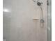 Close up of glass enclosed shower with tiled surround at 9303 Aintree Dr, Indianapolis, IN 46250