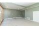 Spacious carpeted basement with natural light from sliding glass doors at 953 S 5Th St, Noblesville, IN 46060