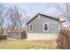 Exterior home and detached garage view featuring stone foundation at 953 S 5Th St, Noblesville, IN 46060