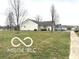 A nicely landscaped yard and sidewalk lead to this attractive single-story house at 1001 Maple W Dr, Lebanon, IN 46052
