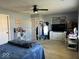 Spacious bedroom featuring neutral paint, a ceiling fan, and a large dresser with a mirror at 1001 Maple W Dr, Lebanon, IN 46052
