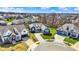 Aerial view of a blue single-Gathering home with a manicured lawn in a suburban neighborhood at 11072 Song Creek Ct, Fishers, IN 46040