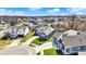 Aerial view of a blue single-Gathering home with a manicured lawn in a suburban neighborhood at 11072 Song Creek Ct, Fishers, IN 46040