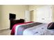 Bedroom featuring a bed with bright linens, a large dresser, and plenty of storage at 11072 Song Creek Ct, Fishers, IN 46040