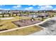 An aerial view of the community playground, a pool, and community lawns at 11072 Song Creek Ct, Fishers, IN 46040