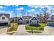 Charming blue single-Gathering home with a cozy front porch and well-manicured lawn on a sunny day at 11072 Song Creek Ct, Fishers, IN 46040