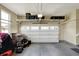 Functional garage with storage racks and space for vehicle parking at 11072 Song Creek Ct, Fishers, IN 46040