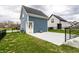 Private backyard featuring a concrete patio, providing an ideal space for relaxation at 11505 Langton Walk, Zionsville, IN 46077