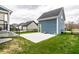Enjoy outdoor living with a concrete patio and expansive backyard, perfect for entertaining at 11505 Langton Walk, Zionsville, IN 46077