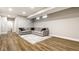 Finished basement Gathering room featuring vinyl plank flooring and neutral paint at 11505 Langton Walk, Zionsville, IN 46077