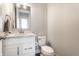 Powder room with marble countertop, and brushed nickel hardware at 11505 Langton Walk, Zionsville, IN 46077
