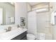 Bright bathroom with a shower and tub combo, as well as a gray vanity with a light countertop at 11505 Langton Walk, Zionsville, IN 46077