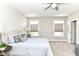 Serene bedroom with soft lighting, plush bedding, and two bright windows at 11505 Langton Walk, Zionsville, IN 46077