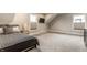 Well-lit bedroom featuring a bed and a large window at 11505 Langton Walk, Zionsville, IN 46077