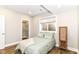 Bright bedroom featuring wood floors, a closet, natural light and neutral walls at 11505 Langton Walk, Zionsville, IN 46077