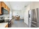 Bright kitchen with a dining table set, stainless steel appliances, and white countertops at 1156 E Mill Run Blvd, Greenfield, IN 46140