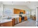 Well-lit kitchen features stainless steel appliances and a window over the sink at 1156 E Mill Run Blvd, Greenfield, IN 46140