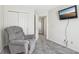 Cozy room with a comfortable recliner and a TV at 1156 E Mill Run Blvd, Greenfield, IN 46140