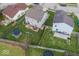 This backyard has green grass, and a patio, providing lots of room for outdoor activities at 11849 Wapiti Way, Noblesville, IN 46060