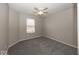 Bedroom featuring carpet, ceiling fan, a window with blinds, and neutral paint at 11849 Wapiti Way, Noblesville, IN 46060