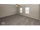 Large bedroom featuring comfortable carpeting and ample natural light from the windows at 11849 Wapiti Way, Noblesville, IN 46060