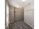 Large walk-in closet with carpet, shelving, and ceiling lighting at 11849 Wapiti Way, Noblesville, IN 46060